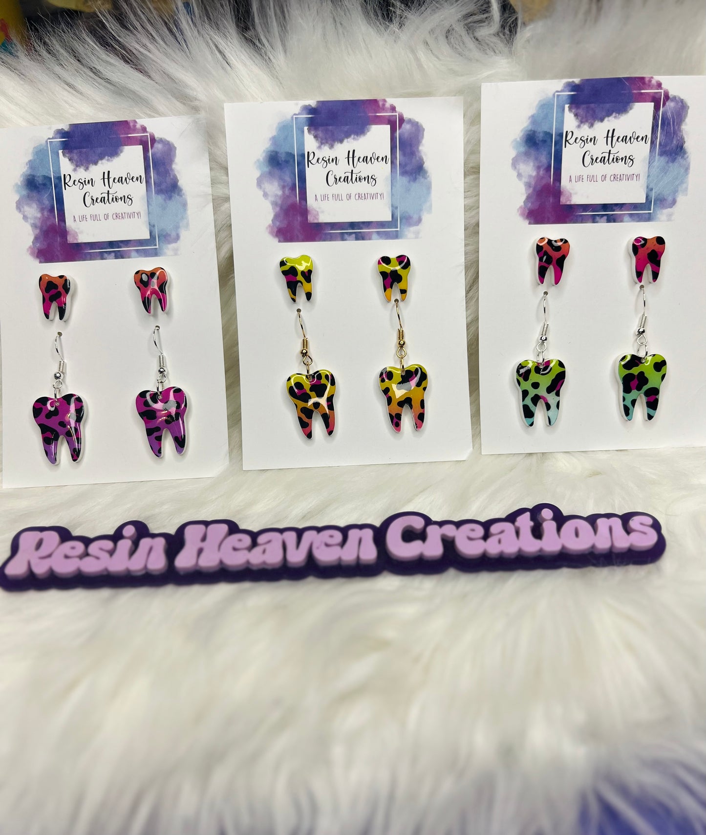 š¦· Stud and dangle earrings set.